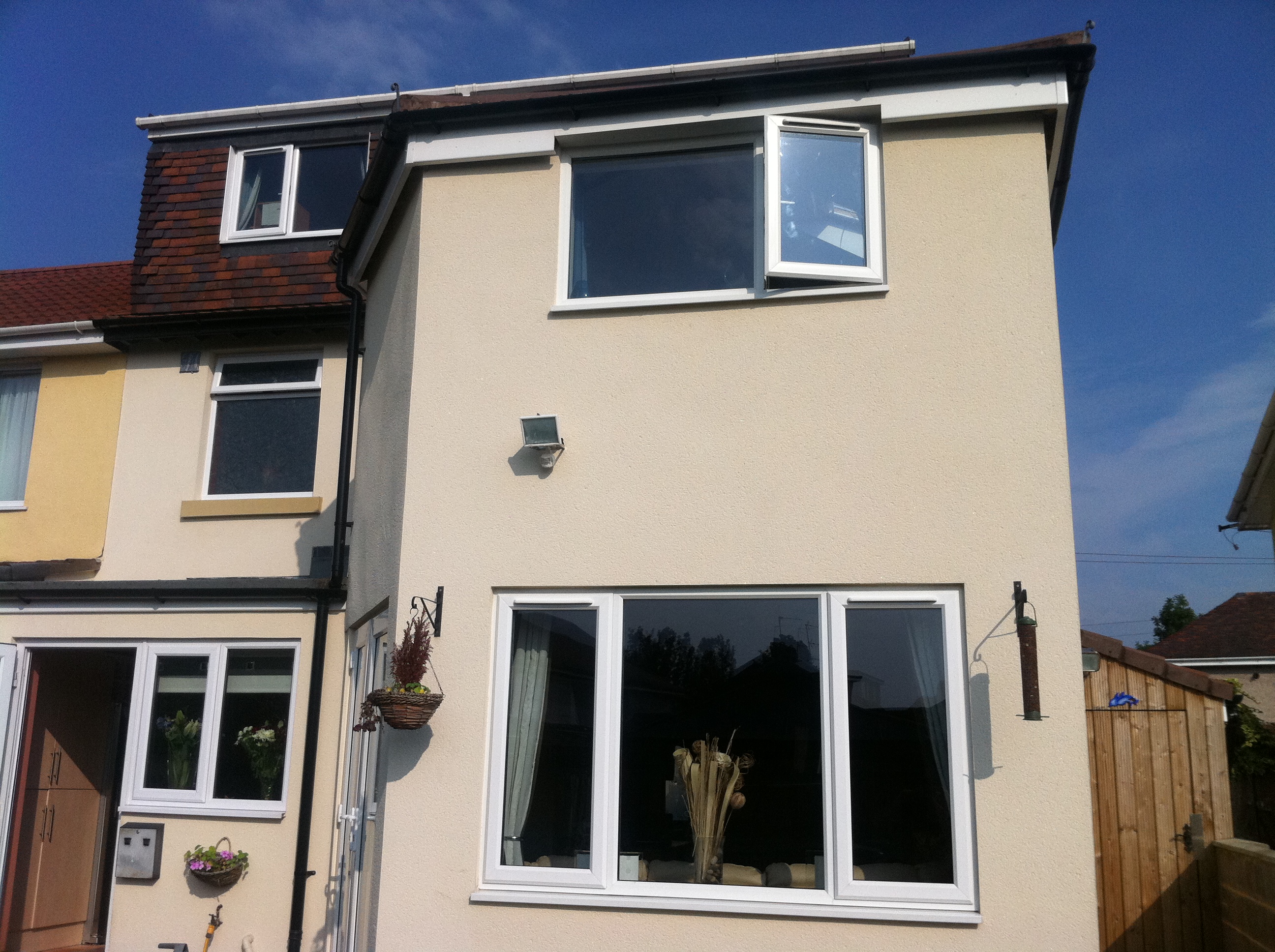 Front of property with extensions