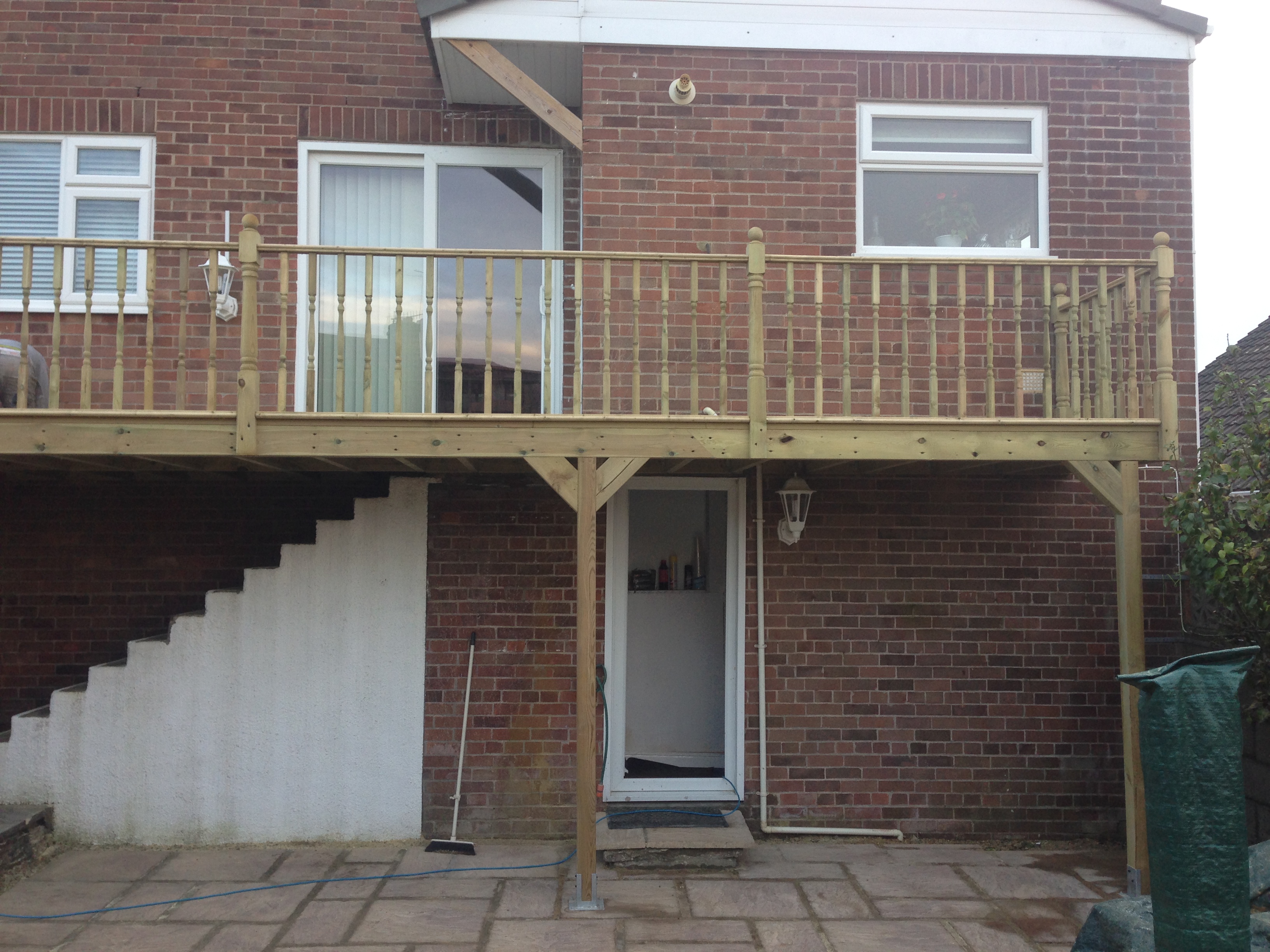 wooden outdoor staircase leading to property